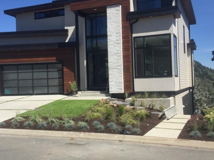 Concrete Driveway With Grass Strips In Abbotsford BC   Concrete Walkway Grass Strips 705x529 